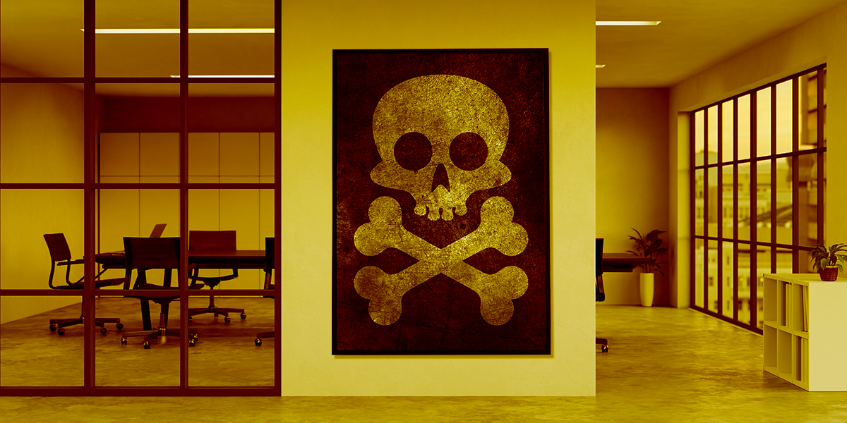 Large skull and cross bones poster on corporate office wall