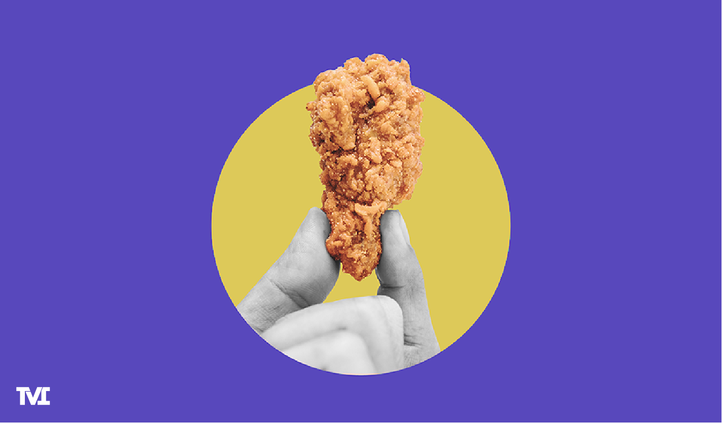 2 fingers holding a chicken tender, on a yellow circle over a purple background