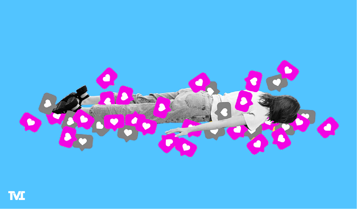 a young woman lying face down covered in Instagram likes (hearts) on a blue background