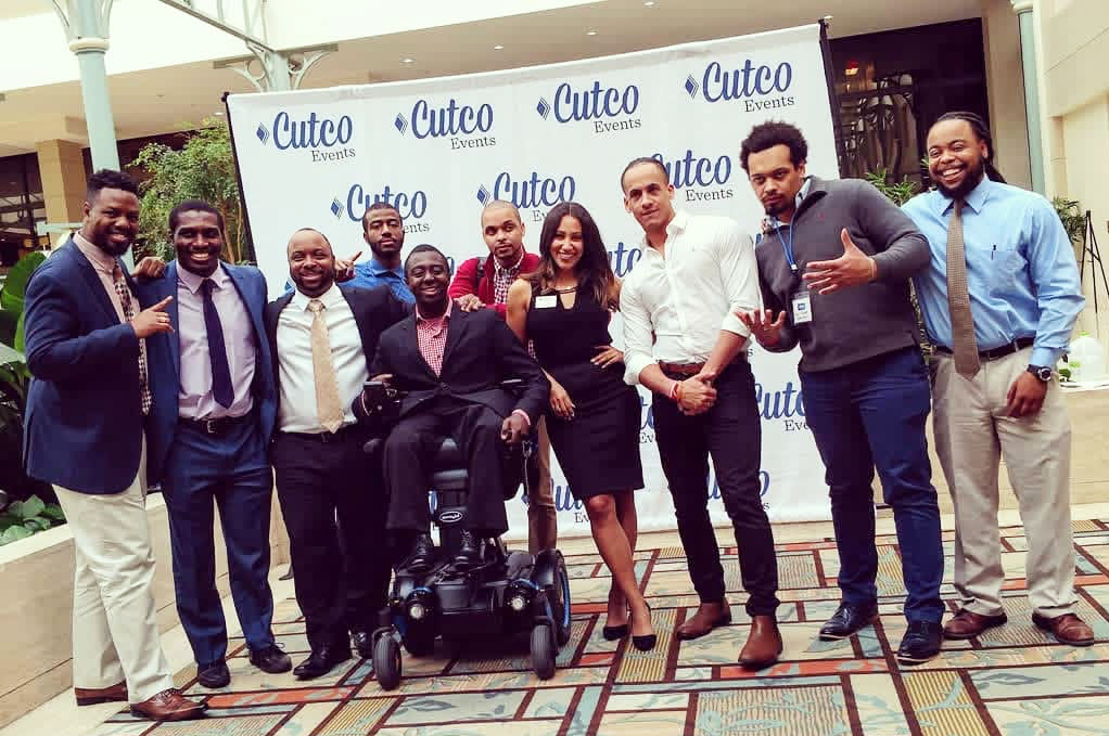 Group shot of Kadeem and colleagues at a Cutco event